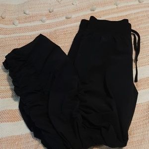 Black Under Armour Storm wind pants/ joggers